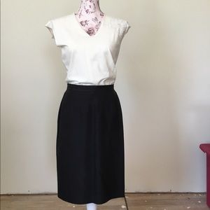 Black 100% Silk fitted skirt.